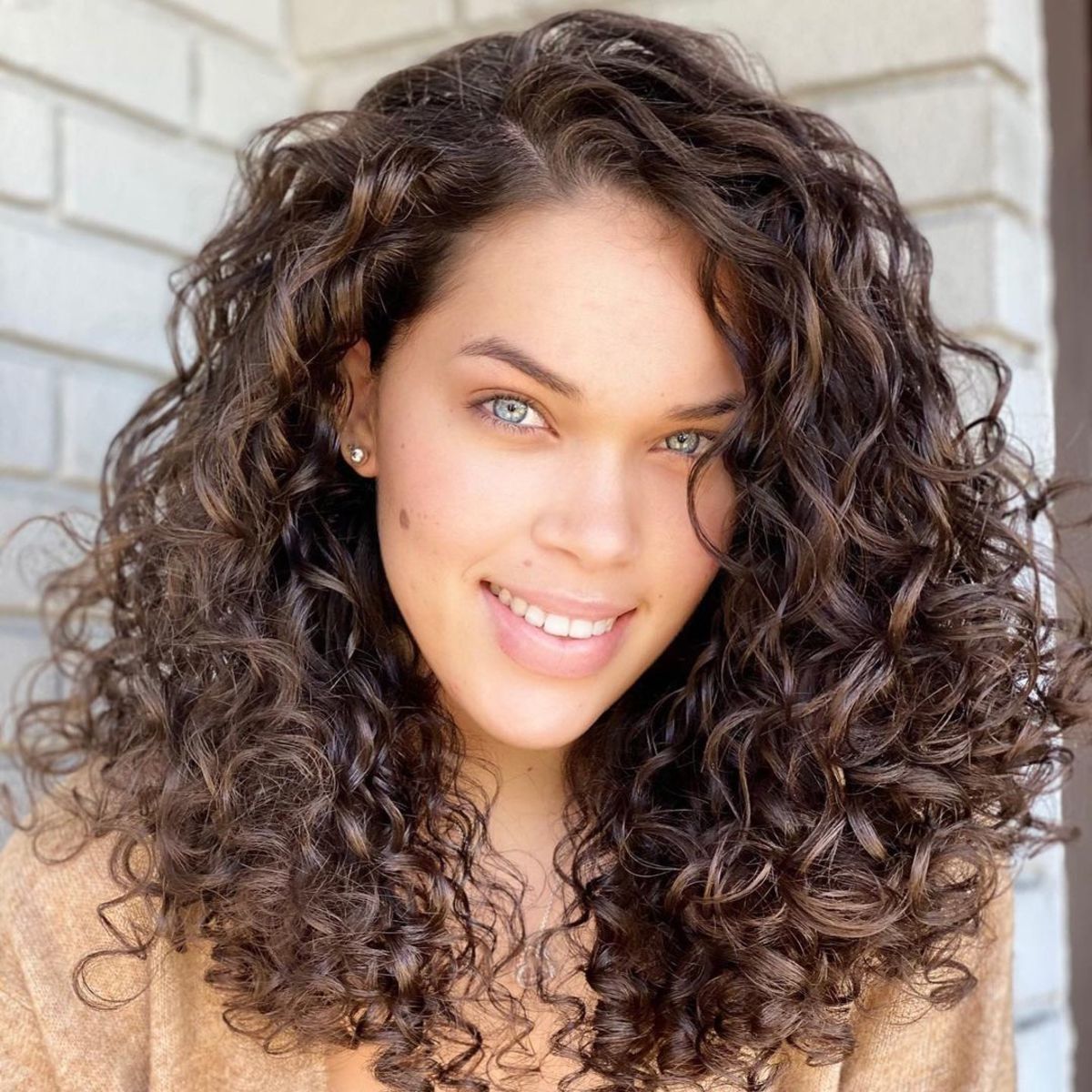 What are some cute hairstyles for people with medium length and naturally curly  hair? If you can please include a picture or tutorial, I really need some  help. - Quora
